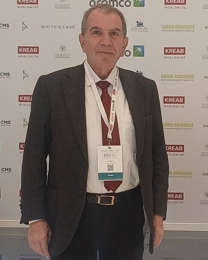 Dr Michel Eid, attorney-at-law, in a suit and tie